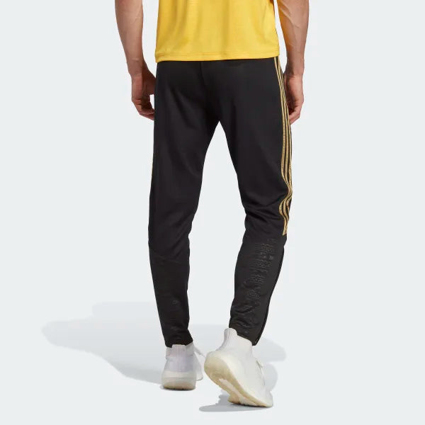 Adidas gold and black 2025 pants